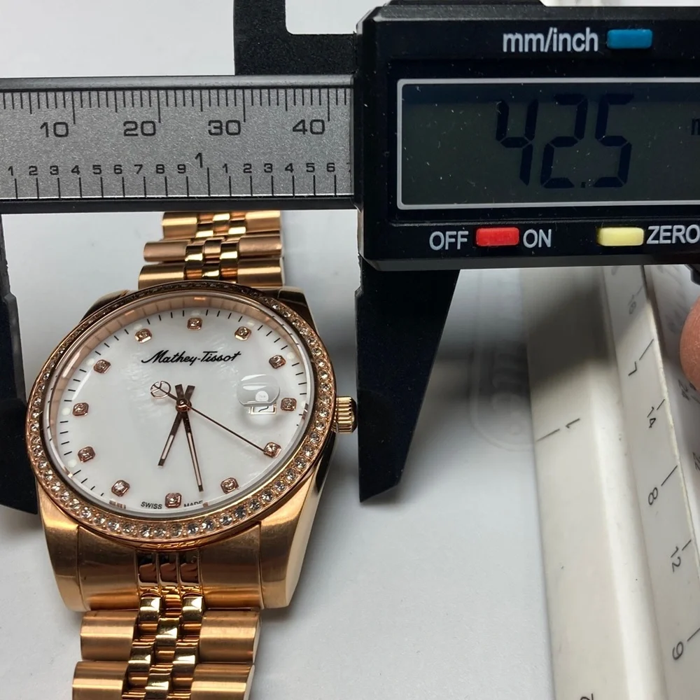 Mathey Tissot H709 rose gold tone, white textured dial, new battery, stainless